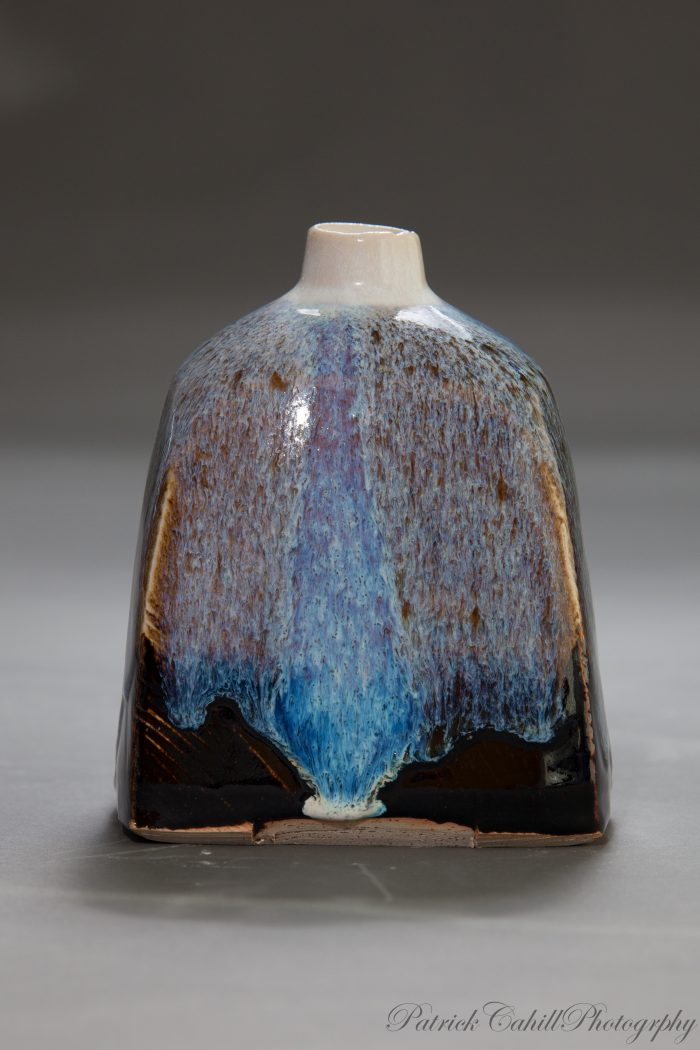 Ceramic squared bottle, glazed with Nuka over Temoku. Hand thrown oxidised stoneware, created by Geoffrey Healy Pottery in Wicklow Ireland.