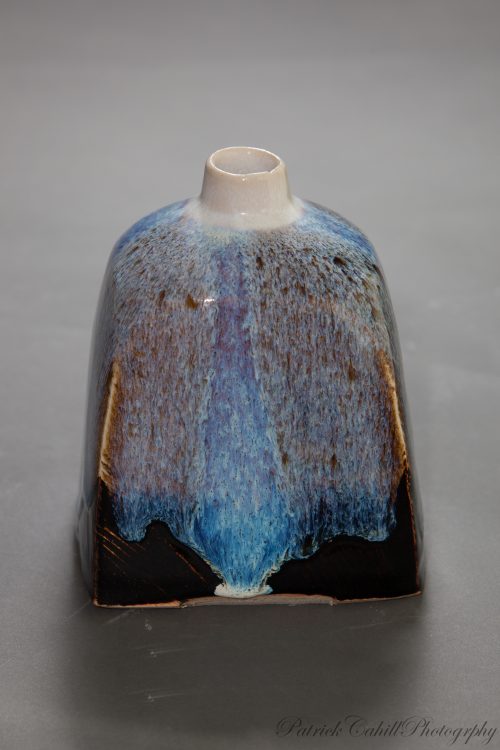 Ceramic squared bottle, glazed with Nuka over Temoku. Hand thrown oxidised stoneware, created by Geoffrey Healy Pottery in Wicklow Ireland.